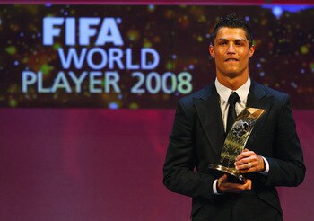 ZURICH, SWITZERLAND - JANUARY 12:  Cristiano Ronaldo of Portugal holds the trophy as he wins The FIFA World Player Of The Year 2008, at the Zurich Opera House on January 12, 2009 in Zurich, Switzerland.  (Photo by John Gichigi/Getty Images)