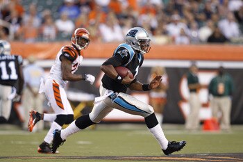 CINCINNATI, OH - AUGUST 25: Cam Newton #1 of the Carolina Panthers breaks free for a 26-yard run in the first half of an NFL preseason game against the Cincinnati Bengals at Paul Brown Stadium on August 25, 2011 in Cincinnati, Ohio. (Photo by Joe Robbins/