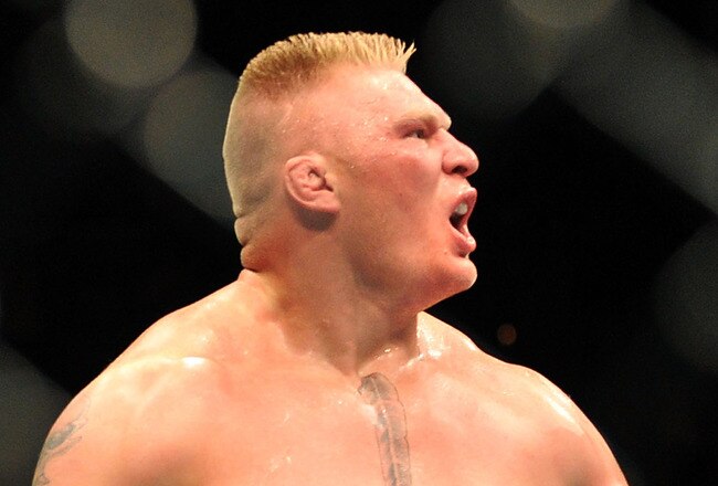 LAS VEGAS - JULY 11:  Brock Lesnar reacts after knocking out Frank Mir during their heavyweight title bout during UFC 100 on July 11, 2009 in Las Vegas, Nevada.  (Photo by Jon Kopaloff/Getty Images)