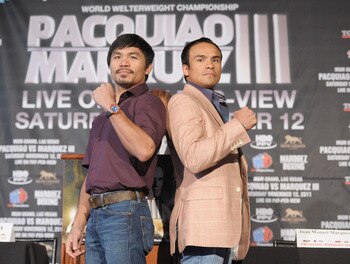 NEW YORK, NY - SEPTEMBER 06:  Professional Boxers Manny Pacquiao (L) and Juan Manuel Marquez attend the press conference for their World Welterweight Championship Fight at The Lighthouse at Chelsea Piers on September 6, 2011 in New York City.  (Photo by M
