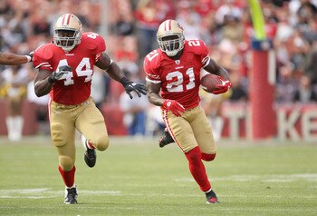 SAN FRANCISCO, CA - AUGUST 20:  Moran Norris #44 and Frank Gore #21 of the San Francisco 49ers in action against the Oakland Raiders at Candlestick Park on August 20, 2011 in San Francisco, California.  (Photo by Ezra Shaw/Getty Images)