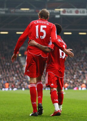 LONDON - APRIL 19:  Peter Crouch of Liverpool celebrates scoring his sides second goal with team mate Jermaine Pennant during the Barclays Premier League match between Fulham and Liverpool at Craven Cottage on April 19, 2008 in London, England.  (Photo by