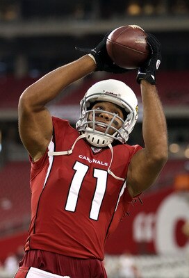 GLENDALE, AZ - SEPTEMBER 01:  Wide receiver Larry Fitzgerald #11 of the Arizona Cardinals warms up before the preseason NFL game against the Denver Broncos at the University of Phoenix Stadium on September 1, 2011 in Glendale, Arizona.  (Photo by Christia