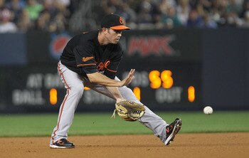 NEW YORK, NY - JULY 29:  J.J. Hardy #2 of the Baltimore Orioles against the New York Yankees on July 29, 2011 at Yankee Stadium in the Bronx borough of New York City.  (Photo by Nick Laham/Getty Images)