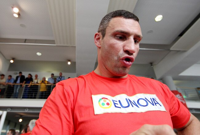 HAMBURG, GERMANY - JUNE 29:  Vitali Klitschko during a public training day to preview the heavy weight title fight between his brother Wladimir Klitschko and David Haye at a Mercedes Benz showroom on June 29, 2011 in Hamburg, Germany.  (Photo by Scott Hea