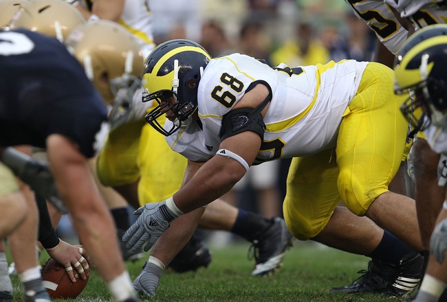 SOUTH BEND, IN - SEPTEMBER 11: Mike Martin #68 of the Michigan Wolverines awaits the start of play against the Notre Dame Fighting Irish at Notre Dame Stadium on September 11, 2010 in South Bend, Indiana. Michigan defeated Notre Dame 28-24.  (Photo by Jon
