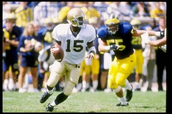 11 Sep 1993:  Quarterback Kevin McDougal of the Notre Dame Fighting Irish runs out of the pocket during a game against the Michigan Wolverines at Michigan Stadium in Ann Arbor, Michigan. Mandatory Credit: Jonathan Daniel  /Allsport