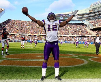 CHICAGO - NOVEMBER 14: Percey Harvin #12 of the Minnesota Vikings celebrates a touchdown catch against the Chicago Bears at Soldier Field on November 14, 2010 in Chicago, Illinois. The Bears defeated the Vikings 27-13. (Photo by Jonathan Daniel/Getty Imag