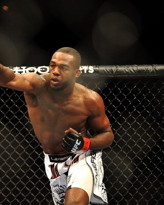 LAS VEGAS - JULY 11:  (R-L) Jon Jones connects with a right punch on Jake O'Brein during their light heavyweight bout during UFC 100 on July 11, 2009 in Las Vegas, Nevada. Jones defeated O'Brein by second round tapout.  (Photo by Jon Kopaloff/Getty Images