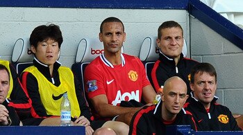 WEST BROMWICH, ENGLAND - AUGUST 14:  Rio Ferdinand and Nemanja Vidic of Manchester United sit on the bench after being substituted during the Barclays Premier League match between West Bromwich Albion and Manchester United at The Hawthorns on August 14, 2