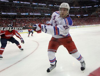 WASHINGTON, DC - APRIL 13: Derek Stepan #21 of the New York Rangers skates against the Washington Capitals in Game One of the Eastern Conference Quarterfinals during the 2011 NHL Stanley Cup Playoffs at Verizon Center on April 13, 2011 in Washington, DC.