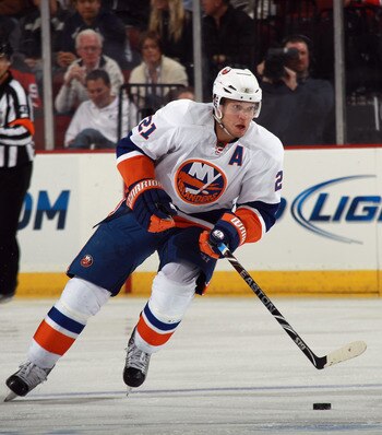 NEWARK, NJ - MARCH 30: Kyle Okposo #21 of the New York Islanders skates against the New Jersey Devils at the Prudential Center on March 30, 2011 in Newark, New Jersey. The Devils defeated the Islanders 3-2.  (Photo by Bruce Bennett/Getty Images)
