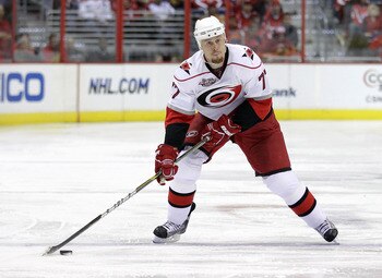 WASHINGTON, DC - MARCH 29:  Joe Corvo #77 of the Carolina Hurricanes skates with the puck a Washington Capitals at the Verizon Center on March 29, 2011 in Washington, DC.  (Photo by Rob Carr/Getty Images)