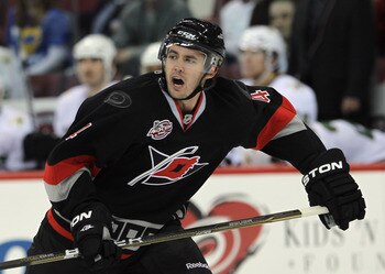RALEIGH, NC - NOVEMBER 29:  Jamie McBain #4 of the Carolina Hurricanes skates against the Dallas Stars at the RBC Center on November 29, 2010 in Raleigh, North Carolina. The Stars defeated the Hurricanes 4-1.  (Photo by Bruce Bennett/Getty Images)