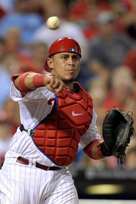 PHILADELPHIA, PA - AUGUST 16: Carlos Ruiz #51 of the Philadelphia Phillies throws to first base on a dropped third strike during the game against the Arizona Diamondbacks at Citizens Bank Park on August 16, 2011 in Philadelphia, Pennsylvania. The Diamondb