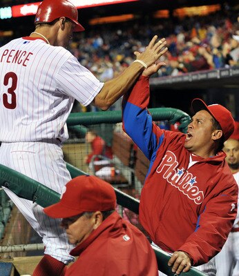 PHILADELPHIA, PA - SEPTEMBER 06: Carlos Ruiz #51 of the Philadelphia Phillies congratulates teammate Hunter Pence #3 after scoring a run in the sixth inning during the game against the Atlanta Braves at Citizens Bank Park on September 6, 2011 in Philadelp