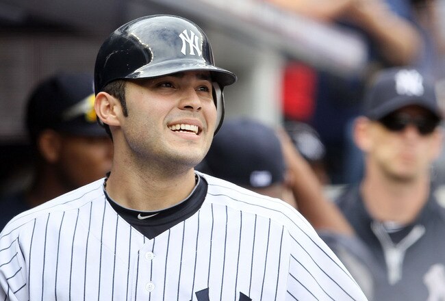 NEW YORK, NY - SEPTEMBER 05:  Jesus Montero #63 of the New York Yankees celebrates his seventh inning two run home run against the Baltimore Orioles on September 5, 2011 at Yankee Stadium in the Bronx borough of New York City. It was montero's second home