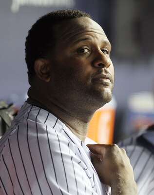 NEW YORK, NY - JULY 26:  CC Sabathia #52 of the New York Yankees looks on from the dugout during the fifth inning against the Seattle Mariners on July 26, 2011 at Yankee Stadium in the Bronx borough of New York City.  (Photo by Jim McIsaac/Getty Images)