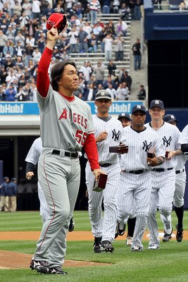 NEW YORK - APRIL 13:  Hideki Matsui #55 of the Los Angeles Angels of Anaheim acknowledges the fans after he received his World Series ring for being a member of the 2009 New York Yankees Worlder Series Championship team prior to playing against the New Yo