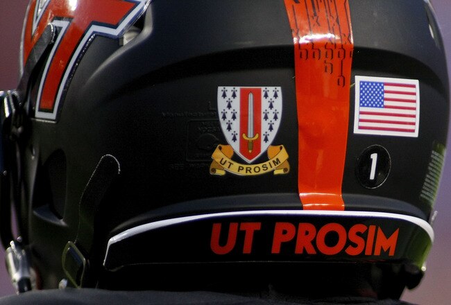 LANDOVER, MD - SEPTEMBER 06:  Safety Antone Exum #1 for the Virginia Tech Hokies wears the helmet designed to honor the Virginia Tech Corps of Cadets against the Boise State Broncos at FedExField on September 6, 2010 in Landover, Maryland.  (Photo by Geof