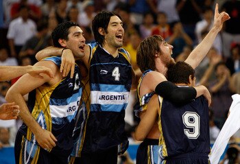 BEIJING - AUGUST 24:  Leonardo Martin Gutierrez #12, Luis Alberto Scola #4, Andres Marcelo Nocioni #13 and Antonio Alejandro Porta Pernigotti #9 of Argentina celebrate their win in the bronze medal game against Lithuania during Day 16 of the Beijing 2008