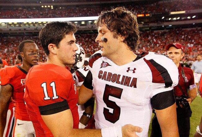 ATHENS, GA - SEPTEMBER 10:  Aaron Murray #11 of the Georgia Bulldogs congratulates Stephen Garcia #5 of the South Carolina Gamecocks at Sanford Stadium on September 10, 2011 in Athens, Georgia.  (Photo by Kevin C. Cox/Getty Images)