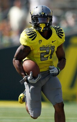 EUGENE, OR - SEPTEMBER 10:  LaMichael James #21 of the Oregon Ducks returns a punt for a touchdown against the Nevada Wolf Pack on September 10, 2011 at the Autzen Stadium in Eugene, Oregon.  (Photo by Jonathan Ferrey/Getty Images)