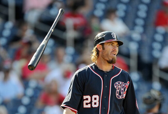 WASHINGTON, DC - SEPTEMBER 11:  Jayson Werth #28 of the Washington Nationals tosses his bat after striking out against the Houston Astros at Nationals Park on September 11, 2011 in Washington, DC.  (Photo by Greg Fiume/Getty Images)