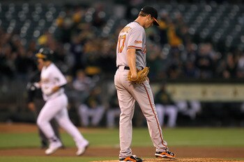 OAKLAND, CA - AUGUST 16:  Josh Willingham #16 of the Oakland Athletics rounds the bases after hitting a home run off of Brian Matusz #17 of the Baltimore Orioles in the third inning at O.co Coliseum on August 16, 2011 in Oakland, California.  (Photo by Ez