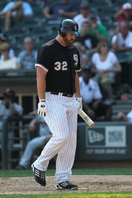 CHICAGO, IL - AUGUST 31: Adam Dunn #32 of the Chicago White Sox walks back to the dugout after striking out with men on base in the 9th inning against the Minnesota Twins at U.S. Cellular Field on August 31, 2011 in Chicago, Illinois. The Twins defeated t
