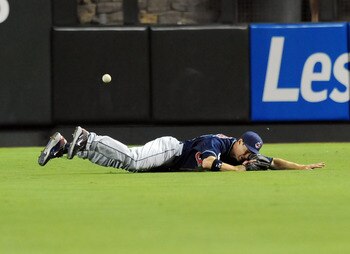 PHOENIX, AZ - JUNE 27:  Grady Sizemore #24 of the Cleveland Indians dives and misses a line drive that rolls to the fence against the Arizona Diamondbacks at Chase Field on June 27, 2011 in Phoenix, Arizona.  (Photo by Norm Hall/Getty Images)