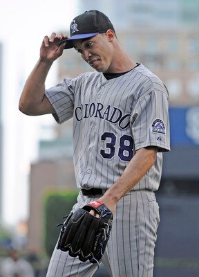 SAN DIEGO, CA - JULY 30: Ubaldo Jimenez #38 of the Colorado Rockies walks off the field after pitching during the first inning of a baseball game against the San Diego Padres at Petco Park on July 30, 2011 in San Diego, California.  (Photo by Denis Poroy/