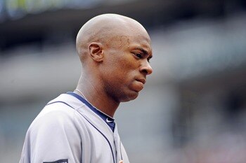 MINNEAPOLIS, MN - AUGUST 27:   Austin Jackson #14 center fielder for the Detroit Tigers walks off the field after the end of the fifth inning against the Minnesota Twins  on August 27, 2011 at Target Field in Minneapolis, Minnesota. Detroit wins 6-4. (Pho