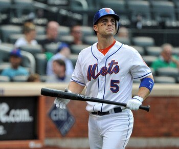 NEW YORK, NY - SEPTEMBER 08: David Wright #5 of the New York Mets walks back to the dugout after striking out in the bottom of the third inning against the Atlanta Braves at Citi Field on September 8, 2011 in the Flushing neighborhood of the Queens boroug