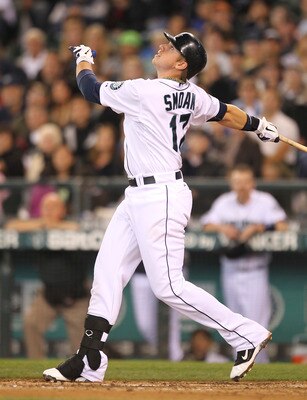 SEATTLE - JULY 17:  Justin Smoak #17 of the Seattle Mariners flies out to left for the final out in a 3-1 loss to the Texas Rangers at Safeco Field on July 17, 2011 in Seattle, Washington. (Photo by Otto Greule Jr/Getty Images)
