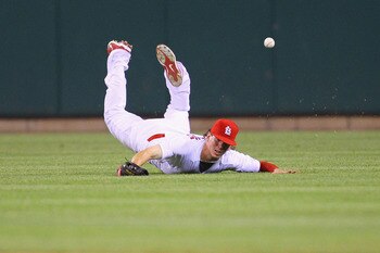 ST. LOUIS, MO - MAY 31: Colby Rasmus #28 of the St. Louis Cardinals misplays a fly ball against the San Francisco Giants at Busch Stadium on May 31, 2011 in St. Louis, Missouri.  (Photo by Dilip Vishwanat/Getty Images)