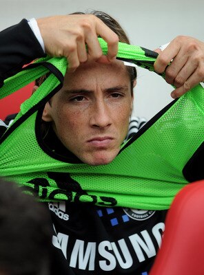 SUNDERLAND, ENGLAND - SEPTEMBER 10:   Fernando Torres of Chelsea looks on from the bench during the Barclays Premier League match between Sunderland and Chelsea at the Stadium of Light on September 10, 2011 in Sunderland, England. (Photo by Michael Regan/