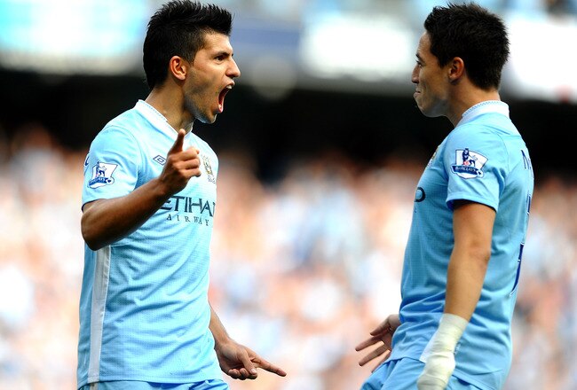 MANCHESTER, ENGLAND - SEPTEMBER 10: Sergio Aguero of Manchester City celebrates his second goal with Samir Nasri during the Barclays Premier League match between Manchester City and Wigan Athletic at Etihad Stadium on September 10, 2011 in Manchester, Eng
