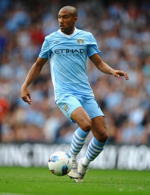MANCHESTER, ENGLAND - SEPTEMBER 10: Gael Clichy of Manchester City in action during the Barclays Premier League match between Manchester City and Wigan Athletic at Etihad Stadium on September 10, 2011 in Manchester, England.  (Photo by Laurence Griffiths/