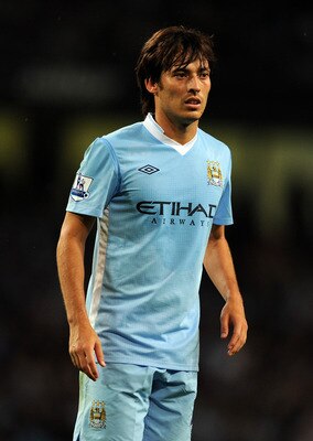 MANCHESTER, ENGLAND - AUGUST 15:  David Silva of Manchester City looks on during the Barclays Premier League match between Manchester City and Swansea City at Etihad Stadium on August 15, 2011 in Manchester, England.  (Photo by Chris Brunskill/Getty Image