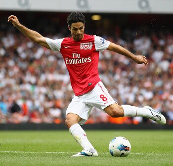 LONDON, ENGLAND - SEPTEMBER 10:  Mikel Arteta of Arsenal in action during the Barclays Premier League match between Arsenal and Swansea City at Emirates Stadium on September 10, 2011 in London, England.  (Photo by Clive Mason/Getty Images)