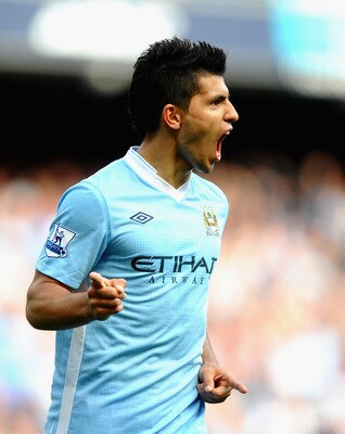 MANCHESTER, ENGLAND - SEPTEMBER 10: Sergio Aguero of Manchester City celebrates his second goal during the Barclays Premier League match between Manchester City and Wigan Athletic at Etihad Stadium on September 10, 2011 in Manchester, England.  (Photo by