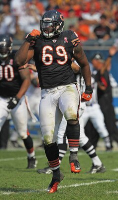 CHICAGO, IL - SEPTEMBER 11: Henry Melton #69 of the Chicago Bears celebrates a sack against the Atlanta Falcons at Soldier Field on September 11, 2011 in Chicago, Illinois. The Bears defeated the Falcons 30-12. (Photo by Jonathan Daniel/Getty Images)