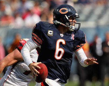 CHICAGO, IL - SEPTEMBER 11:  Jay Cutler #6 of the Chicago Bears rolls out to look for a receiver against the Atlanta Falcons at Soldier Field on September 11, 2011 in Chicago, Illinois. The Bears defeated the Falcons 30-12.  (Photo by Jonathan Daniel/Gett