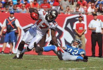 TAMPA, FL - SEPTEMBER 11:  Wide receiver Arrelious Benn #17 of the Tampa Bay Buccaneers rushes upfield with a pass against the Detroit Lions during the season opener September 11, 2011 at Raymond James Stadium in Tampa, Florida. (Photo by Al Messerschmidt