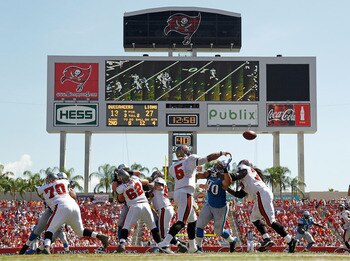 TAMPA, FL - SEPTEMBER 11:  Josh Freeman #5 of the Tampa Bay Buccaneers makes a pass during the season opener against the Detroit Lions at Raymond James Stadium on September 11, 2011 in Tampa, Florida.  (Photo by Mike Ehrmann/Getty Images)