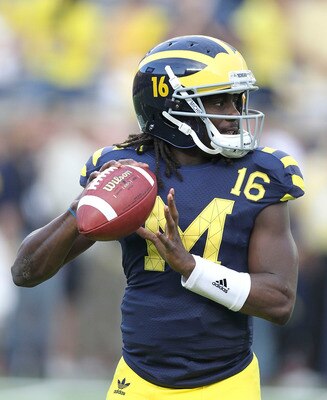 ANN ARBOR, MI - SEPTEMBER 10: Denard Robinson #16 of the Univerity of Michigan warms up prior to the start of the game against the University of Notre Dame at Michigan Stadium on September 10, 2011 in Ann Arbor, Michigan.  (Photo by Leon Halip/Getty Image