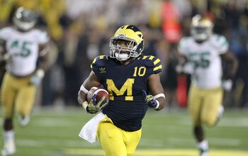 ANN ARBOR, MI - SEPTEMBER 10:  Jeremy Gallon #10 of the University of Michigan catches a 64 yards pass from Denard Robinson #16 late in the fourth quarter during the game against the Notre Dame Irish at Michigan Stadium on September 10, 2011 in Ann Arbor,