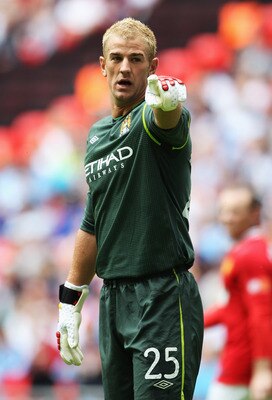 LONDON, ENGLAND - AUGUST 07:  Joe Hart of Manchester City gestures during the FA Community Shield match sponsored by McDonald's between Manchester City and Manchester United at Wembley Stadium on August 7, 2011 in London, England.  (Photo by Clive Rose/Ge