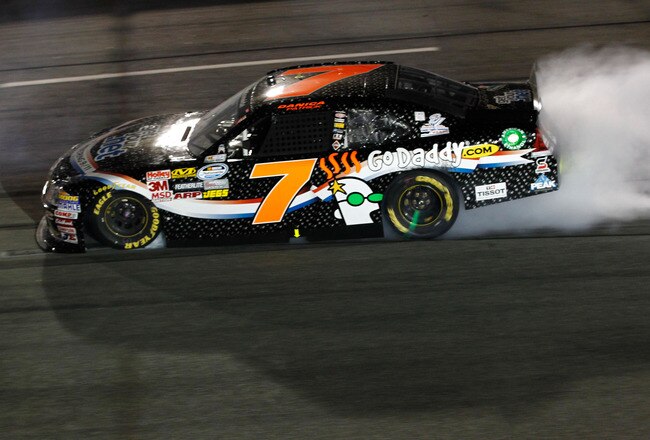 RICHMOND, VA - SEPTEMBER 09:  Danica Patrick, driver of the #7 GoDaddy.com/GetYour.NET Chevrolet, locks up her brakes during the NASCAR Nationwide Virginia 529 College Savings 250 at Richmond International Raceway on September 9, 2011 in Richmond, Virgini